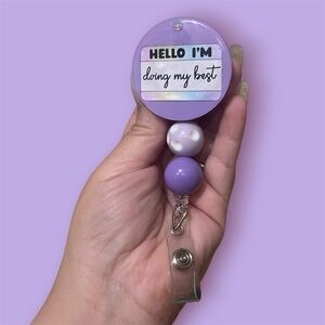 Purple and White Badge Reel